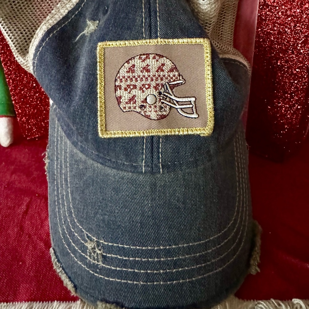 Judith March Cap